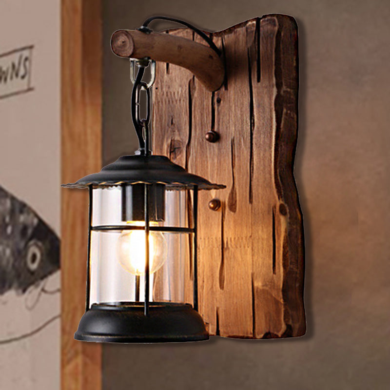 Kerosene Dining Room Wall Lighting Fixture Antiqued Clear Glass 1-Head Brown Sconce with Wood Leaf/Key Backplate Clearhalo 'Art deco wall lights' 'Cast Iron' 'Glass' 'Industrial wall lights' 'Industrial' 'Middle century wall lights' 'Modern' 'Rustic wall lights' 'Tiffany' 'Traditional wall lights' 'Wall Lamps & Sconces' 'Wall Lights' Lighting' 1043874