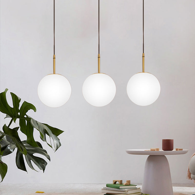 One Light Round Ceiling Pendant Light Modern Brass White Glass Hanging Lamp for Dining Room, 6"/8" Wide White 6" Clearhalo 'Art Deco Pendants' 'Cast Iron' 'Ceiling Lights' 'Ceramic' 'Crystal' 'Industrial Pendants' 'Industrial' 'Metal' 'Middle Century Pendants' 'Pendant Lights' 'Pendants' 'Tiffany' Lighting' 139841