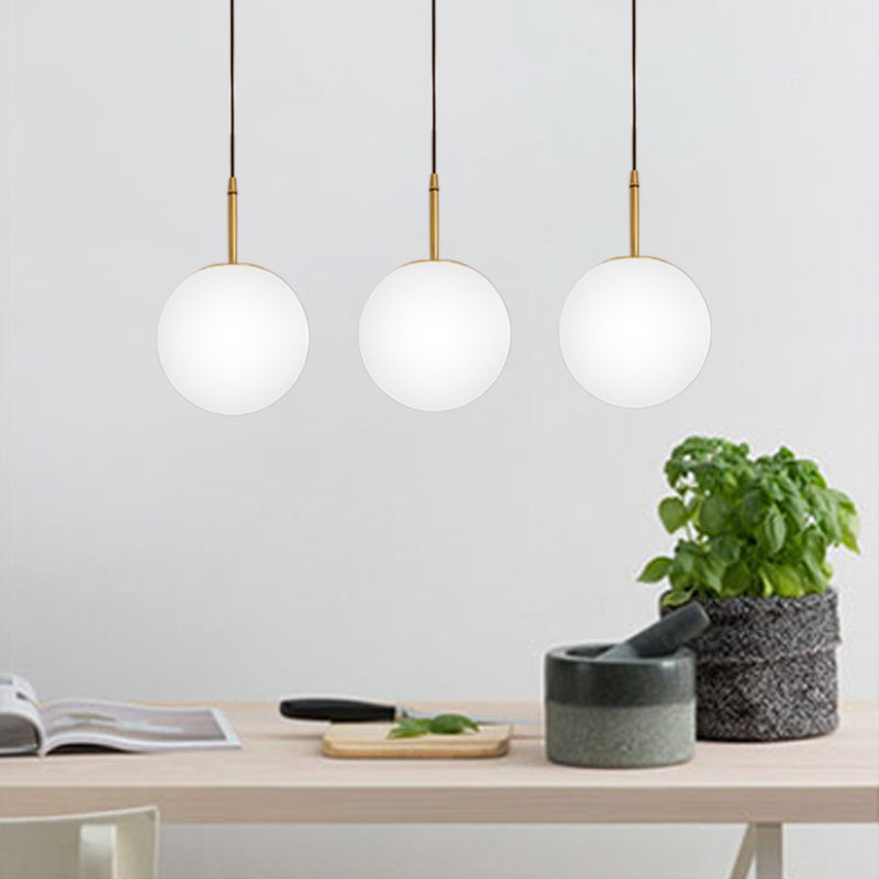 One Light Round Ceiling Pendant Light Modern Brass White Glass Hanging Lamp for Dining Room, 6"/8" Wide Clearhalo 'Art Deco Pendants' 'Cast Iron' 'Ceiling Lights' 'Ceramic' 'Crystal' 'Industrial Pendants' 'Industrial' 'Metal' 'Middle Century Pendants' 'Pendant Lights' 'Pendants' 'Tiffany' Lighting' 139844