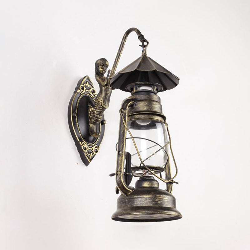 Kerosene Clear Glass Wall Hanging Light Coastal Single Bulb Living Room Sconce Lamp in Black/Antique Brass Clearhalo 'Art deco wall lights' 'Cast Iron' 'Glass' 'Industrial wall lights' 'Industrial' 'Middle century wall lights' 'Modern' 'Rustic wall lights' 'Tiffany' 'Traditional wall lights' 'Wall Lamps & Sconces' 'Wall Lights' Lighting' 1419286