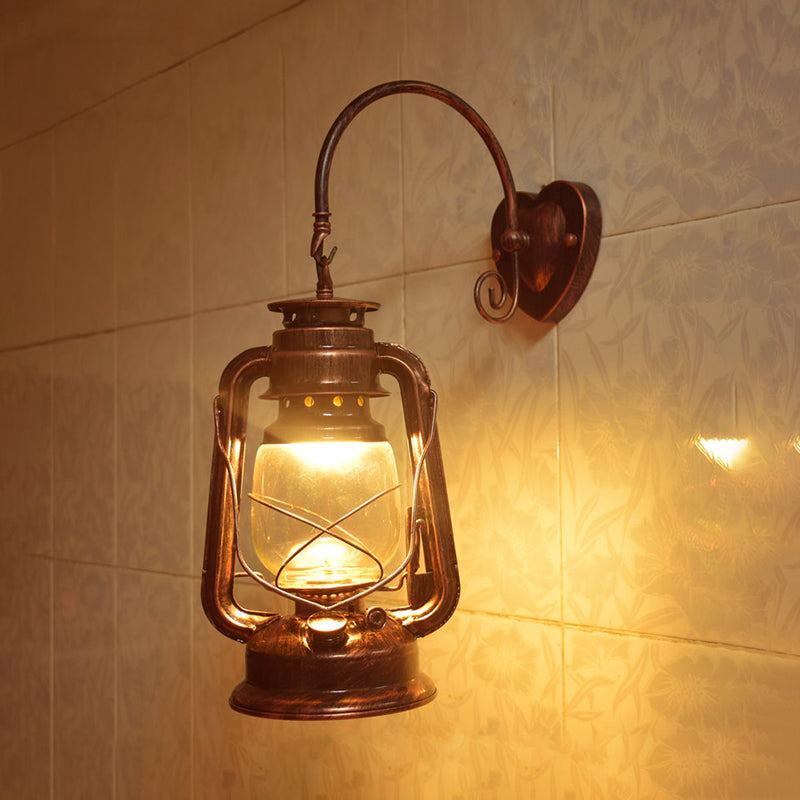 Coastal Lantern Wall Lighting Fixture 1 Bulb Clear Glass Sconce Light in Black/Bronze/Copper for Corridor Clearhalo 'Art deco wall lights' 'Cast Iron' 'Glass' 'Industrial wall lights' 'Industrial' 'Middle century wall lights' 'Modern' 'Rustic wall lights' 'Tiffany' 'Traditional wall lights' 'Wall Lamps & Sconces' 'Wall Lights' Lighting' 1419700