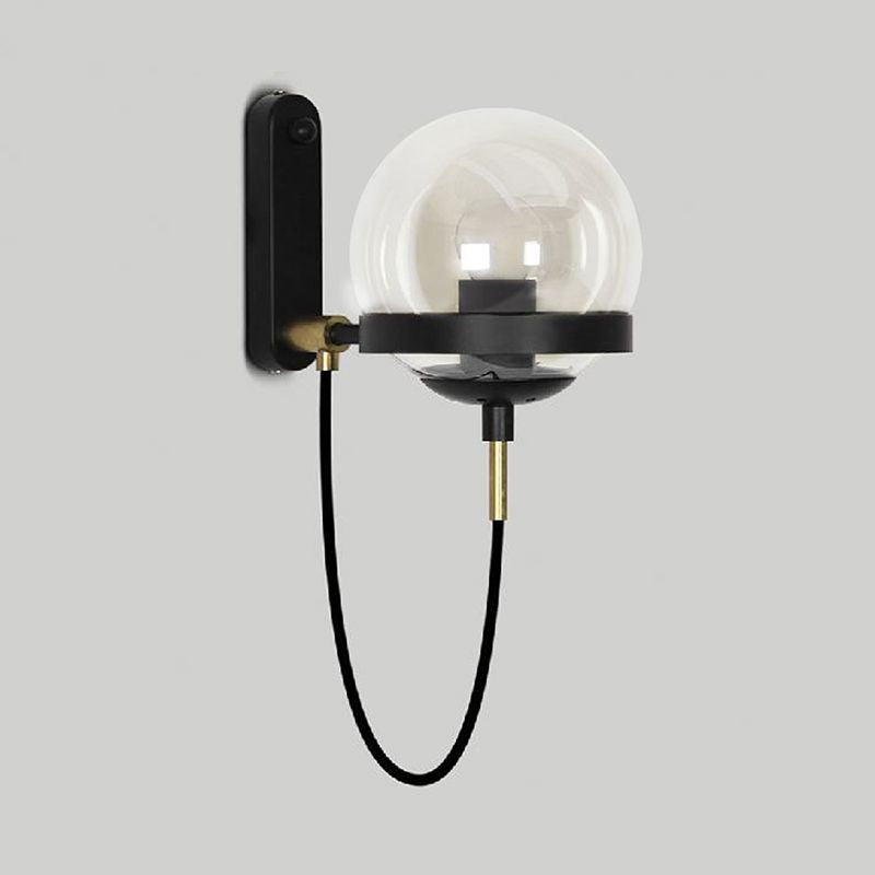 Black/Gold Globe Wall Lighting Modern Clear/Frosted Glass 1 Light Living Room Sconce Light Fixture Clearhalo 'Art deco wall lights' 'Cast Iron' 'Glass' 'Industrial wall lights' 'Industrial' 'Middle century wall lights' 'Modern' 'Rustic wall lights' 'Tiffany' 'Traditional wall lights' 'Wall Lamps & Sconces' 'Wall Lights' Lighting' 1420591