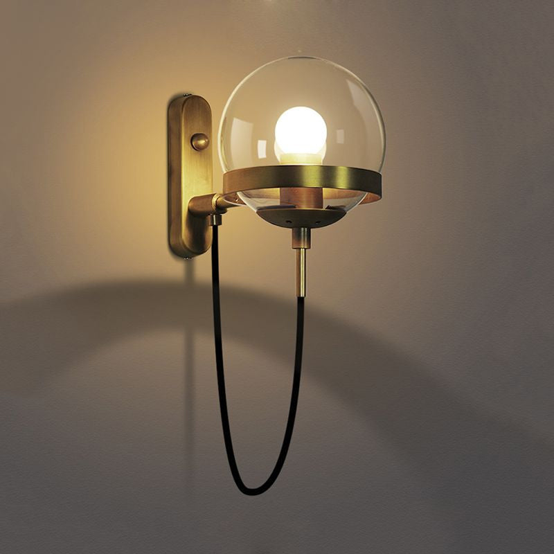 Black/Gold Globe Wall Lighting Modern Clear/Frosted Glass 1 Light Living Room Sconce Light Fixture Clearhalo 'Art deco wall lights' 'Cast Iron' 'Glass' 'Industrial wall lights' 'Industrial' 'Middle century wall lights' 'Modern' 'Rustic wall lights' 'Tiffany' 'Traditional wall lights' 'Wall Lamps & Sconces' 'Wall Lights' Lighting' 1420592