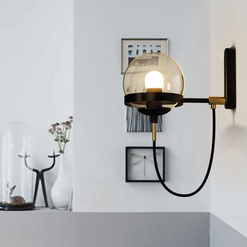 Black/Gold Globe Wall Lighting Modern Clear/Frosted Glass 1 Light Living Room Sconce Light Fixture Clearhalo 'Art deco wall lights' 'Cast Iron' 'Glass' 'Industrial wall lights' 'Industrial' 'Middle century wall lights' 'Modern' 'Rustic wall lights' 'Tiffany' 'Traditional wall lights' 'Wall Lamps & Sconces' 'Wall Lights' Lighting' 143602