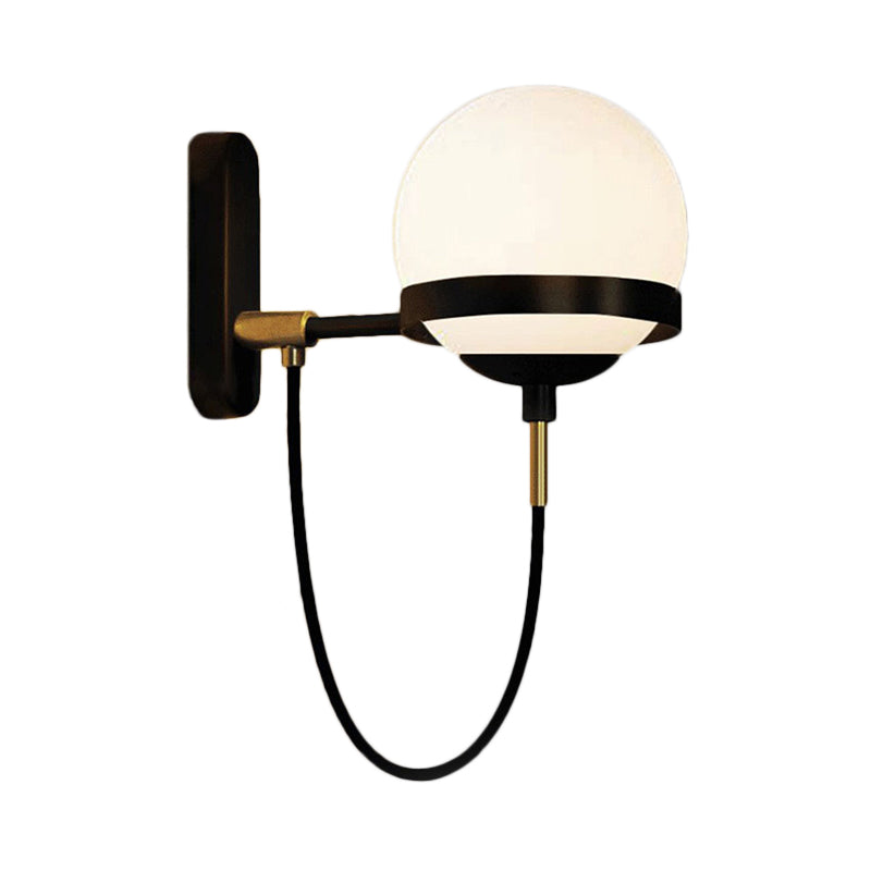 Black/Gold Globe Wall Lighting Modern Clear/Frosted Glass 1 Light Living Room Sconce Light Fixture Clearhalo 'Art deco wall lights' 'Cast Iron' 'Glass' 'Industrial wall lights' 'Industrial' 'Middle century wall lights' 'Modern' 'Rustic wall lights' 'Tiffany' 'Traditional wall lights' 'Wall Lamps & Sconces' 'Wall Lights' Lighting' 143608