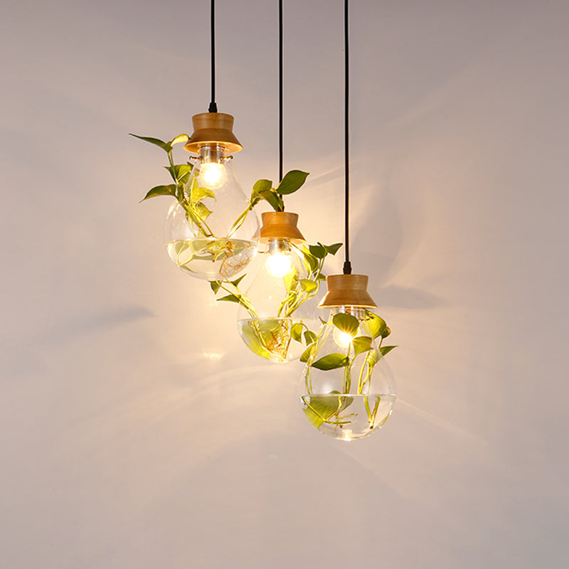 3 Heads Bulb Shape Cluster Pendant Vintage Wood Clear Glass Hanging Light Fixture with Round/Linear Canopy Clearhalo 'Ceiling Lights' 'Close To Ceiling Lights' 'Glass shade' 'Glass' 'Industrial Pendants' 'Industrial' 'Middle Century Pendants' 'Pendant Lights' 'Pendants' 'Tiffany' Lighting' 1454776