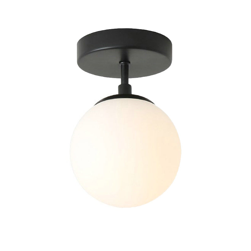 Single Bulb Corridor Ceiling Flush Simple Black Semi Flush Mount Light with Mini Spherical Milk Glass Shade Clearhalo 'Ceiling Lights' 'Close To Ceiling Lights' 'Close to ceiling' 'Glass shade' 'Glass' 'Semi-flushmount' Lighting' 1454787
