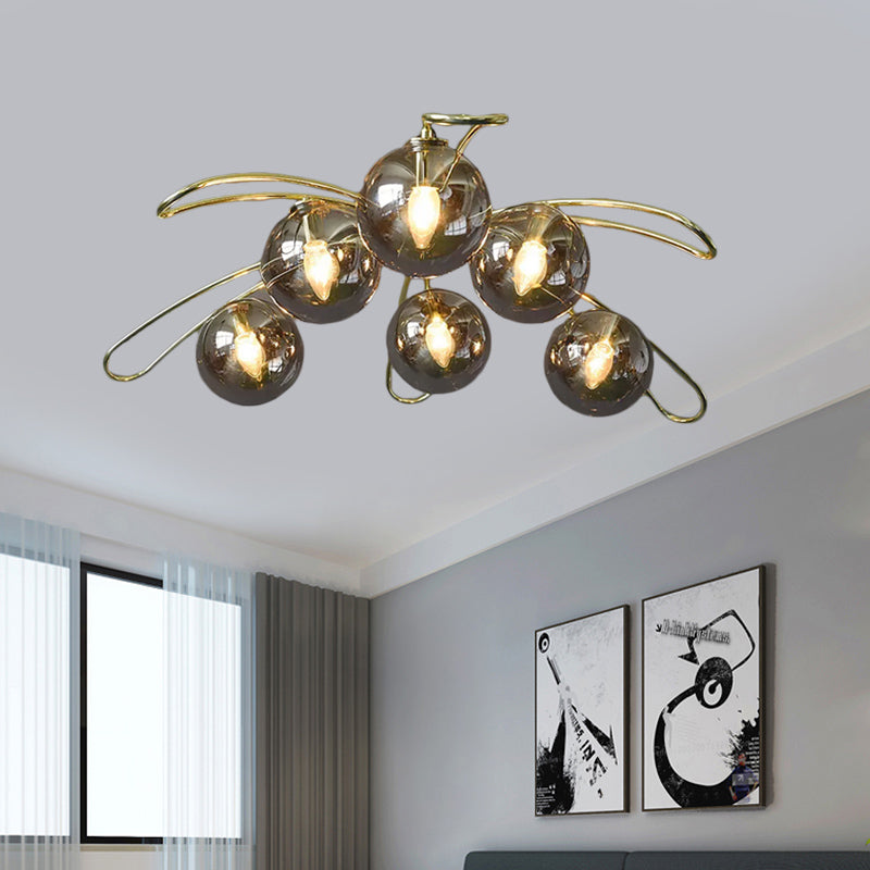 Smoke Glass Ball Flush Chandelier Mid Century 6 Lights Brass Ceiling Mount Lamp with Branch Design Clearhalo 'Ceiling Lights' 'Close To Ceiling Lights' 'Close to ceiling' 'Glass shade' 'Glass' 'Semi-flushmount' Lighting' 1454849