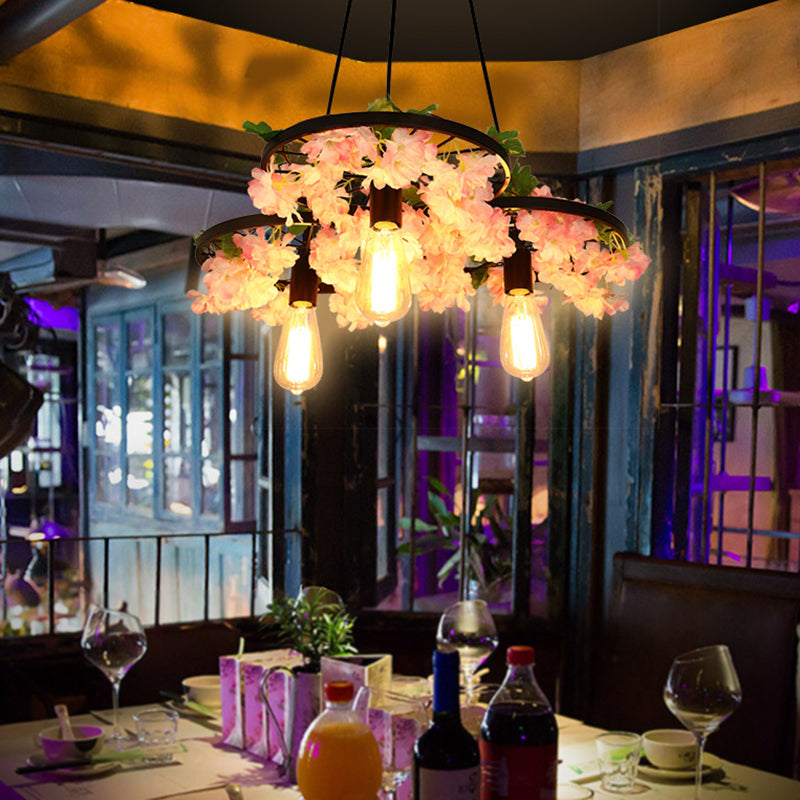 Antique Wheel Chandelier Lighting Fixture 3/6 Heads Iron Ceiling Pendant Light in Black with Flower Decor 3 Black Clearhalo 'Cast Iron' 'Ceiling Lights' 'Chandeliers' 'Industrial Chandeliers' 'Industrial' 'Metal' 'Middle Century Chandeliers' 'Rustic Chandeliers' 'Tiffany' Lighting' 1459011