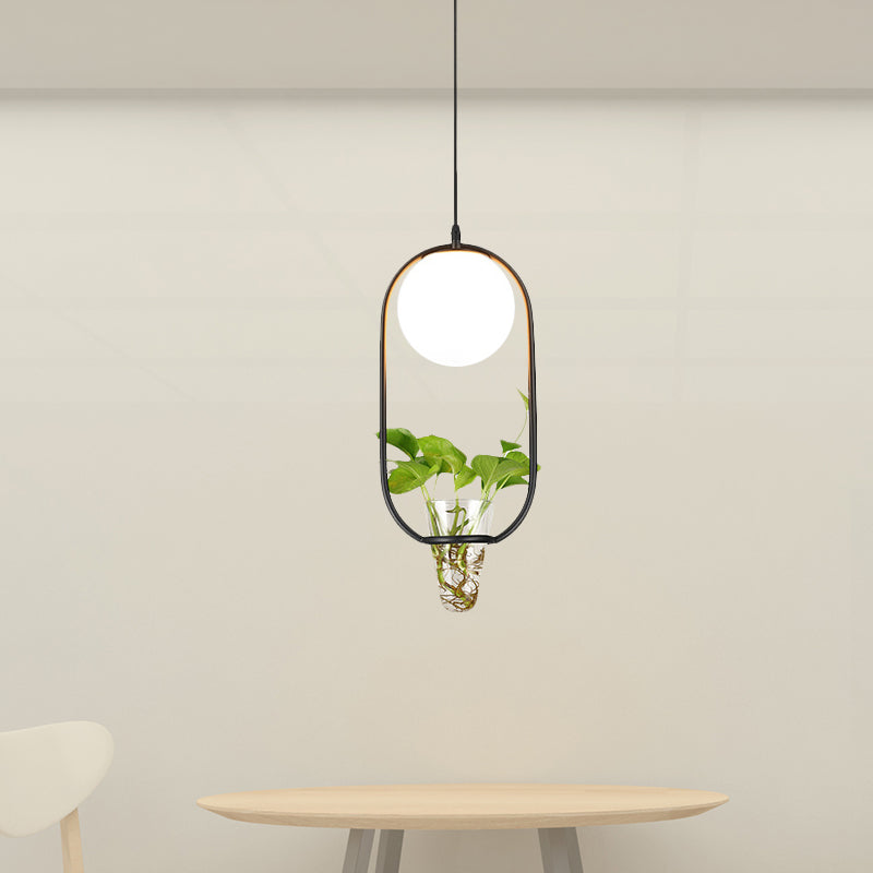 Opal Glass Globe Pendant Light Loft 1 Head Living Room Hanging Lamp in Black/Grey/Gold with Oblong Cage and Plant Cup Black Clearhalo 'Art Deco Pendants' 'Black' 'Cast Iron' 'Ceiling Lights' 'Ceramic' 'Crystal' 'Industrial Pendants' 'Industrial' 'Metal' 'Middle Century Pendants' 'Pendant Lights' 'Pendants' 'Rustic Pendants' 'Tiffany' Lighting' 1459808