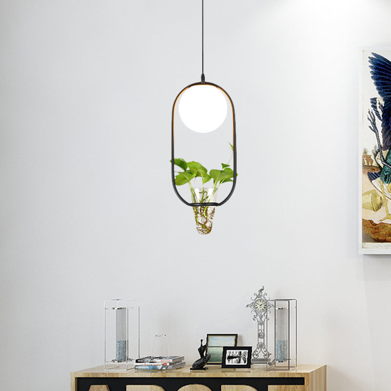 Opal Glass Globe Pendant Light Loft 1 Head Living Room Hanging Lamp in Black/Grey/Gold with Oblong Cage and Plant Cup Clearhalo 'Art Deco Pendants' 'Black' 'Cast Iron' 'Ceiling Lights' 'Ceramic' 'Crystal' 'Industrial Pendants' 'Industrial' 'Metal' 'Middle Century Pendants' 'Pendant Lights' 'Pendants' 'Rustic Pendants' 'Tiffany' Lighting' 1459809