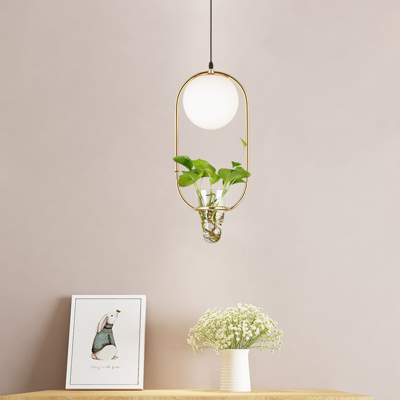 Opal Glass Globe Pendant Light Loft 1 Head Living Room Hanging Lamp in Black/Grey/Gold with Oblong Cage and Plant Cup Gold Clearhalo 'Art Deco Pendants' 'Black' 'Cast Iron' 'Ceiling Lights' 'Ceramic' 'Crystal' 'Industrial Pendants' 'Industrial' 'Metal' 'Middle Century Pendants' 'Pendant Lights' 'Pendants' 'Rustic Pendants' 'Tiffany' Lighting' 1459816