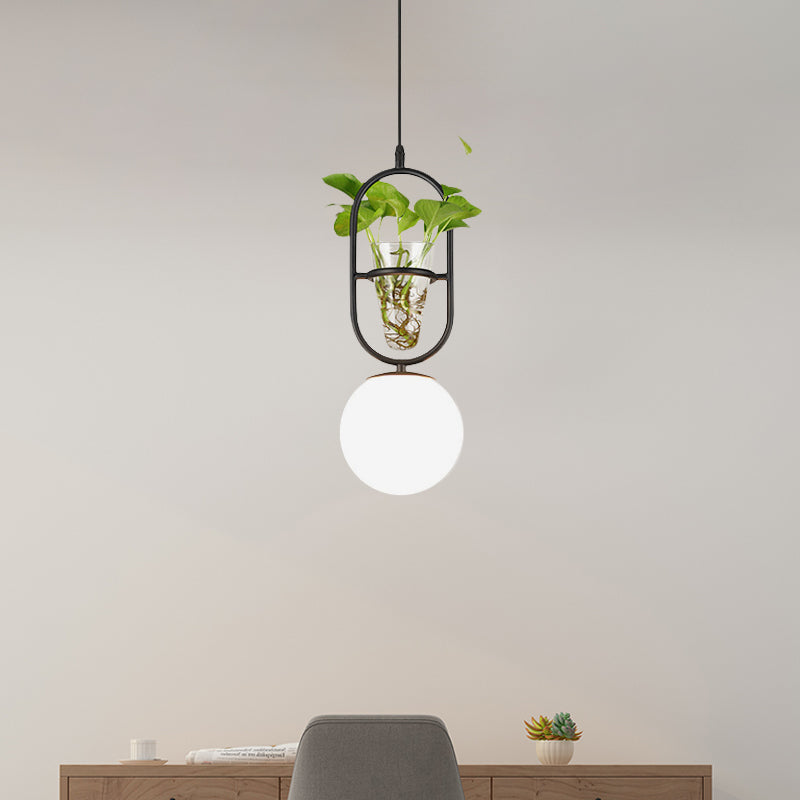 Elliptical Iron Pendant Lamp Loft 1 Light Bedroom Hanging Light in Black/Grey/Gold with Sphere Cream Glass Shade and Plant Cup Black Clearhalo 'Art Deco Pendants' 'Black' 'Cast Iron' 'Ceiling Lights' 'Ceramic' 'Crystal' 'Industrial Pendants' 'Industrial' 'Metal' 'Middle Century Pendants' 'Pendant Lights' 'Pendants' 'Rustic Pendants' 'Tiffany' Lighting' 1459853
