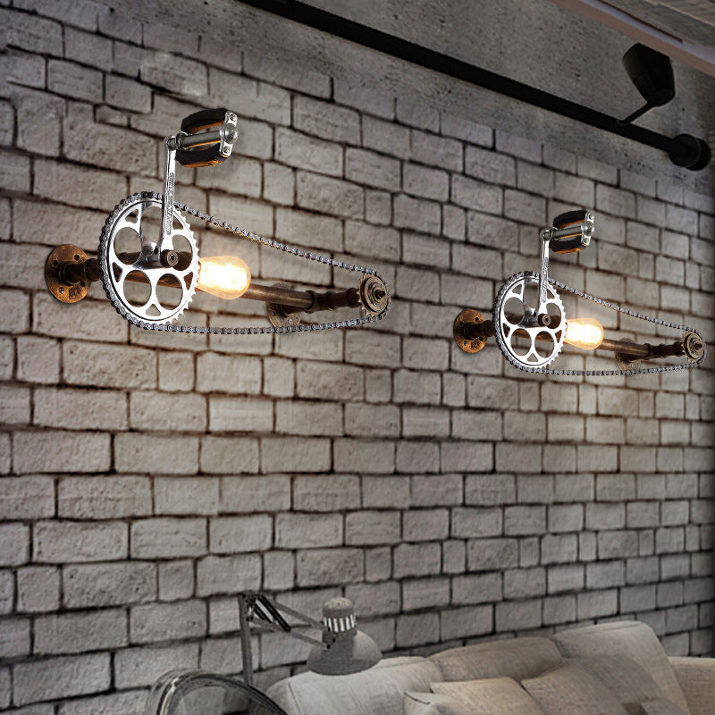 Iron Gear Bike Wall Lamp Warehouse 1 Light Restaurant Wall Mounted Light in Bronze with Pipe Arm Clearhalo 'Cast Iron' 'Glass' 'Industrial wall lights' 'Industrial' 'Middle century wall lights' 'Modern' 'Rustic wall lights' 'Tiffany' 'Traditional wall lights' 'Wall Lamps & Sconces' 'Wall Lights' Lighting' 1472695