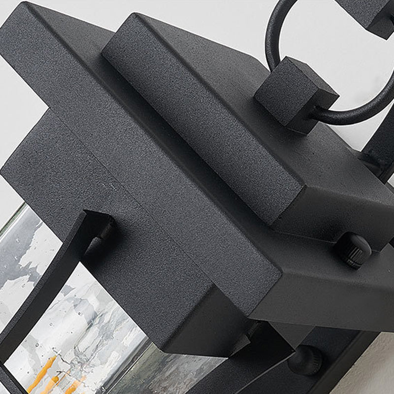Clear Glass Black Sconce Light Square/Rectangle 1-Light Coastal Wall Lamp Fixture with Iron Cage Clearhalo 'Art deco wall lights' 'Cast Iron' 'Glass' 'Industrial wall lights' 'Industrial' 'Middle century wall lights' 'Modern' 'Rustic wall lights' 'Tiffany' 'Traditional wall lights' 'Wall Lamps & Sconces' 'Wall Lights' Lighting' 149974