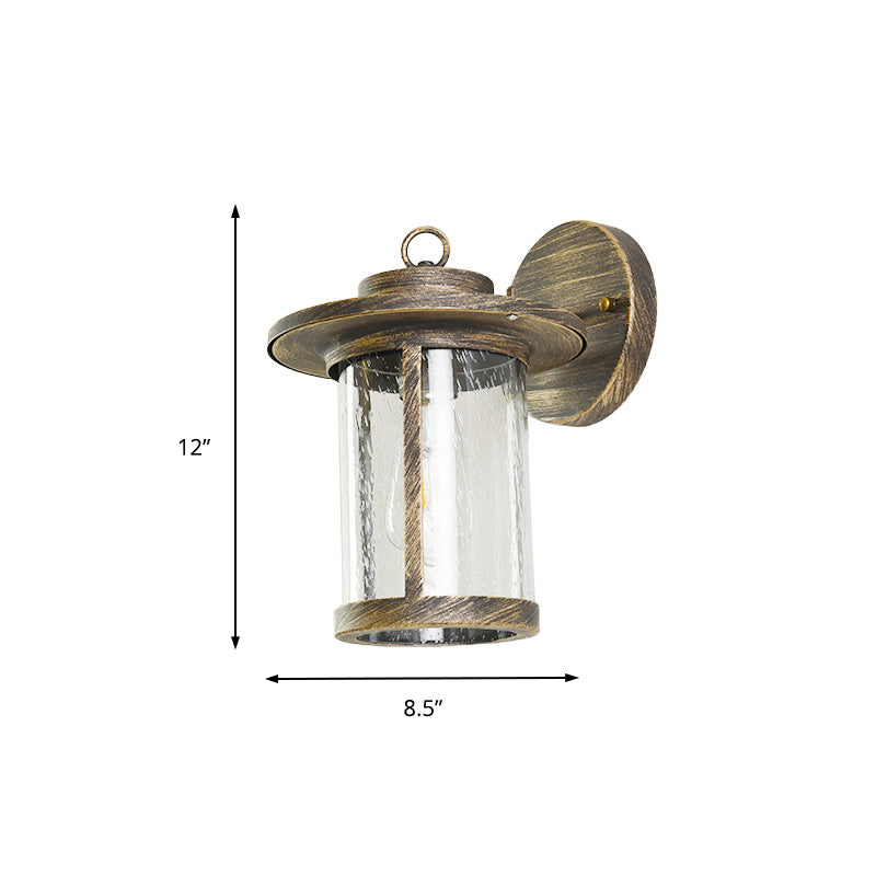Cylinder Seeded Glass Wall Mounted Lamp Industrial Single Bulb Porch Sconce Light in Matte Black/Bronze with Cage Clearhalo 'Art deco wall lights' 'Cast Iron' 'Glass' 'Industrial wall lights' 'Industrial' 'Middle century wall lights' 'Modern' 'Rustic wall lights' 'Tiffany' 'Traditional wall lights' 'Wall Lamps & Sconces' 'Wall Lights' Lighting' 150071