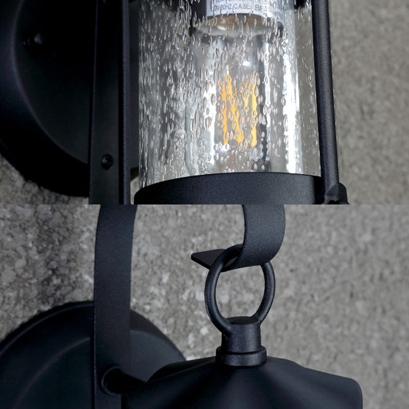 One Bulb Wall Light with Cylinder/Lantern Shade Bubble Glass Industrial Porch Sconce Lighting Fixture in Black Clearhalo 'Art deco wall lights' 'Cast Iron' 'Glass' 'Industrial wall lights' 'Industrial' 'Middle century wall lights' 'Modern' 'Rustic wall lights' 'Tiffany' 'Traditional wall lights' 'Wall Lamps & Sconces' 'Wall Lights' Lighting' 150222