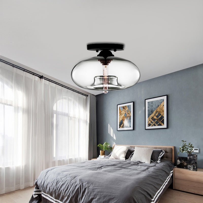 Glass Oval Flush Mount Lamp Simple Style 1 Light Clear/Amber/Smoky Ceiling Flush Mount for Hallway Clear Clearhalo 'Ceiling Lights' 'Close To Ceiling Lights' 'Close to ceiling' 'Glass shade' 'Glass' 'Island Lights' 'Semi-flushmount' Lighting' 151114