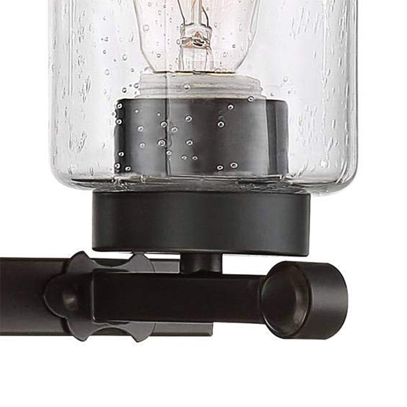 3-Bulb Seeded Glass Sconce Light Fixture Industrial Black Cylinder Dining Room Wall Lamp in Clear Clearhalo 'Cast Iron' 'Glass' 'Industrial wall lights' 'Industrial' 'Middle century wall lights' 'Modern' 'Tiffany' 'Traditional wall lights' 'Wall Lamps & Sconces' 'Wall Lights' Lighting' 159790