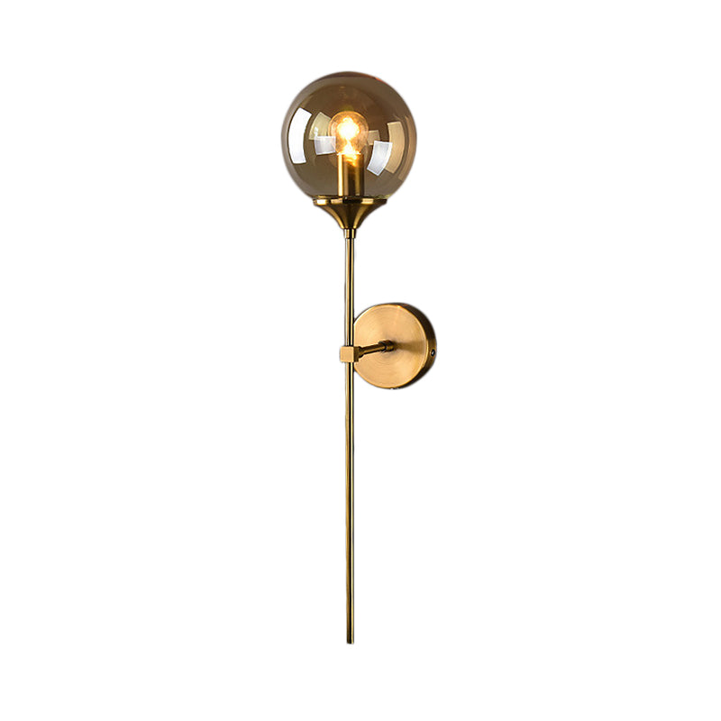 Modern Globe Shade Wall Lighting Single Bulb Clear/Grey/Amber Glass Sconce Light in Brass for Bedroom Clearhalo 'Art deco wall lights' 'Cast Iron' 'Glass' 'Industrial wall lights' 'Industrial' 'Middle century wall lights' 'Modern' 'Rustic wall lights' 'Tiffany' 'Traditional wall lights' 'Wall Lamps & Sconces' 'Wall Lights' Lighting' 163879