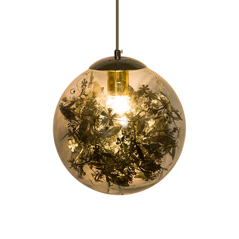 Globe Bedroom Hanging Light Clear Glass 1-Light Modernist Pendant Lighting with Inner Leaf Decor in Silver/Gold Clearhalo 'Ceiling Lights' 'Chandeliers' 'Glass shade' 'Glass' 'Pendant Lights' 'Pendants' Lighting' 1650042