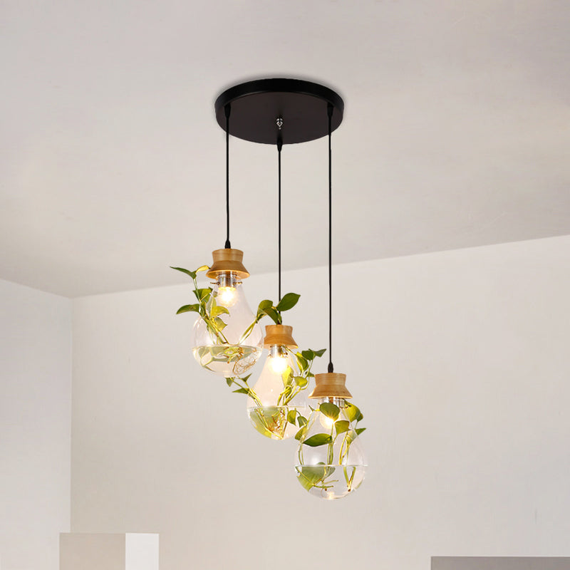 12"/19.5" W 3-Head Cluster Pendant Farmhouse Bulb Shaped Clear Glass Hanging Light Kit in Black, Linear/Round Canopy Black 12" Clearhalo 'Ceiling Lights' 'Glass shade' 'Glass' 'Pendant Lights' 'Pendants' Lighting' 1781286
