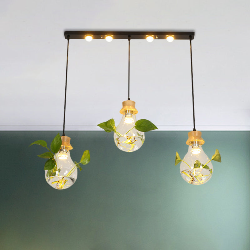 12"/19.5" W 3-Head Cluster Pendant Farmhouse Bulb Shaped Clear Glass Hanging Light Kit in Black, Linear/Round Canopy Clearhalo 'Ceiling Lights' 'Glass shade' 'Glass' 'Pendant Lights' 'Pendants' Lighting' 1781292