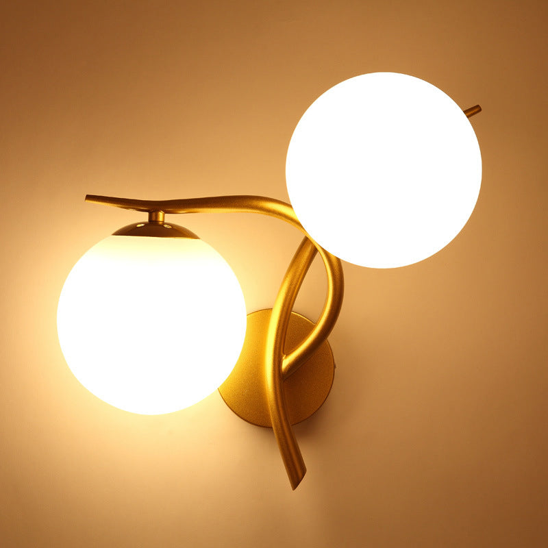 Gold Winding Wall Light Modern 2 Heads Metal Sconce Lighting Fixture with Orb Milk Glass Lampshade Clearhalo 'Cast Iron' 'Glass' 'Industrial' 'Modern wall lights' 'Modern' 'Tiffany' 'Traditional wall lights' 'Wall Lamps & Sconces' 'Wall Lights' Lighting' 1788584