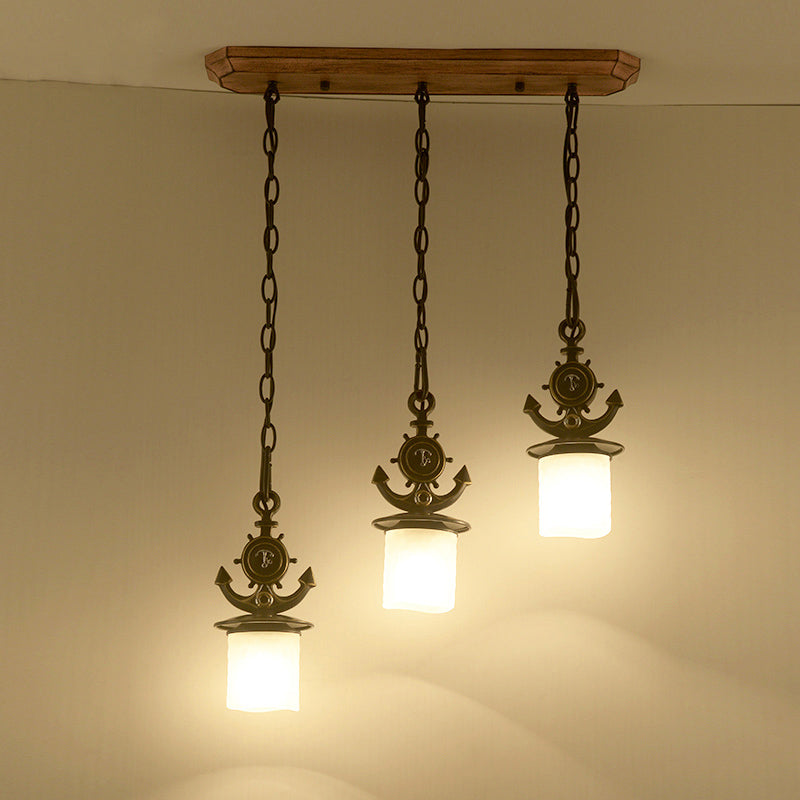Black Cylinder Suspension Lamp Creative 3 Lights Opaque Glass Multi Pendant with Anchor Chain, Linear/Round Canopy Clearhalo 'Ceiling Lights' 'Glass shade' 'Glass' 'Pendant Lights' 'Pendants' Lighting' 1933905