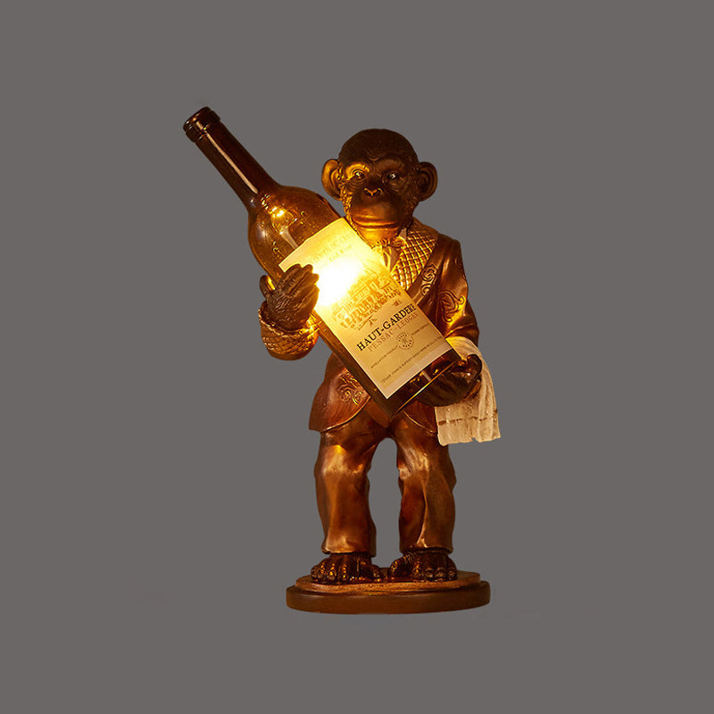 1-Light Desk Lamp Retro Gorilla Holding Wine Amber Glass Night Table Lighting in Red/Gold Clearhalo 'Lamps' 'Table Lamps' Lighting' 1934211