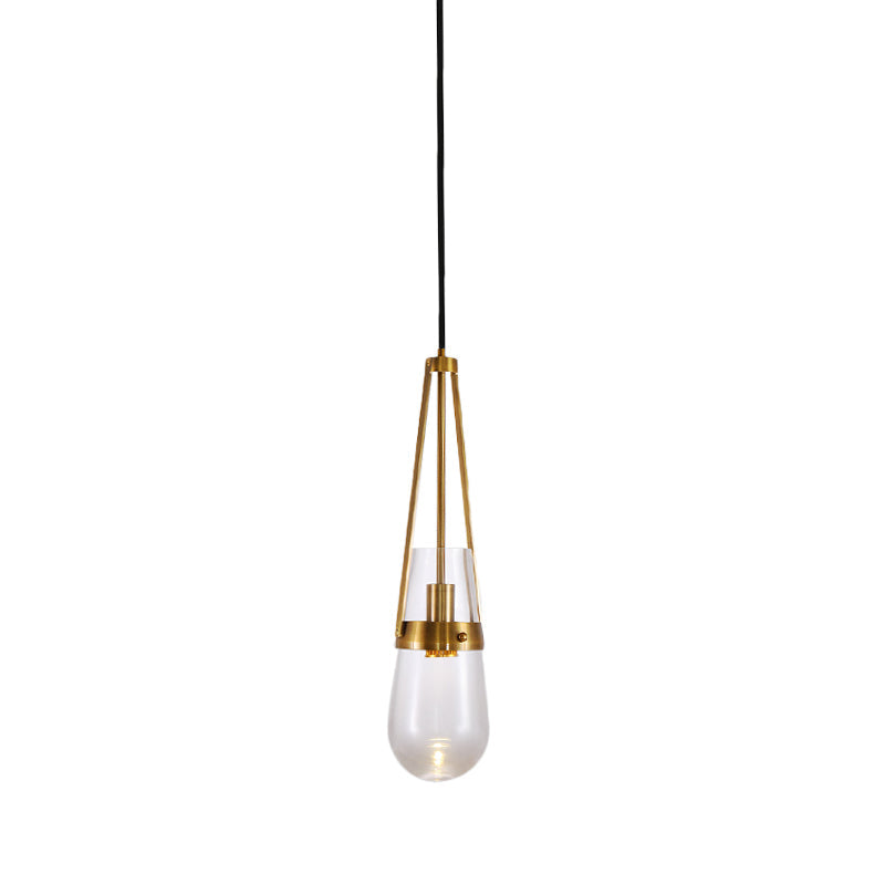 Drop Shaped Dining Room Hanging Lamp Clear/Blue Glass 1 Light Postmodern Pendulum Light with Gripper in Brass Clearhalo 'Ceiling Lights' 'Modern Pendants' 'Modern' 'Pendant Lights' 'Pendants' Lighting' 1937122