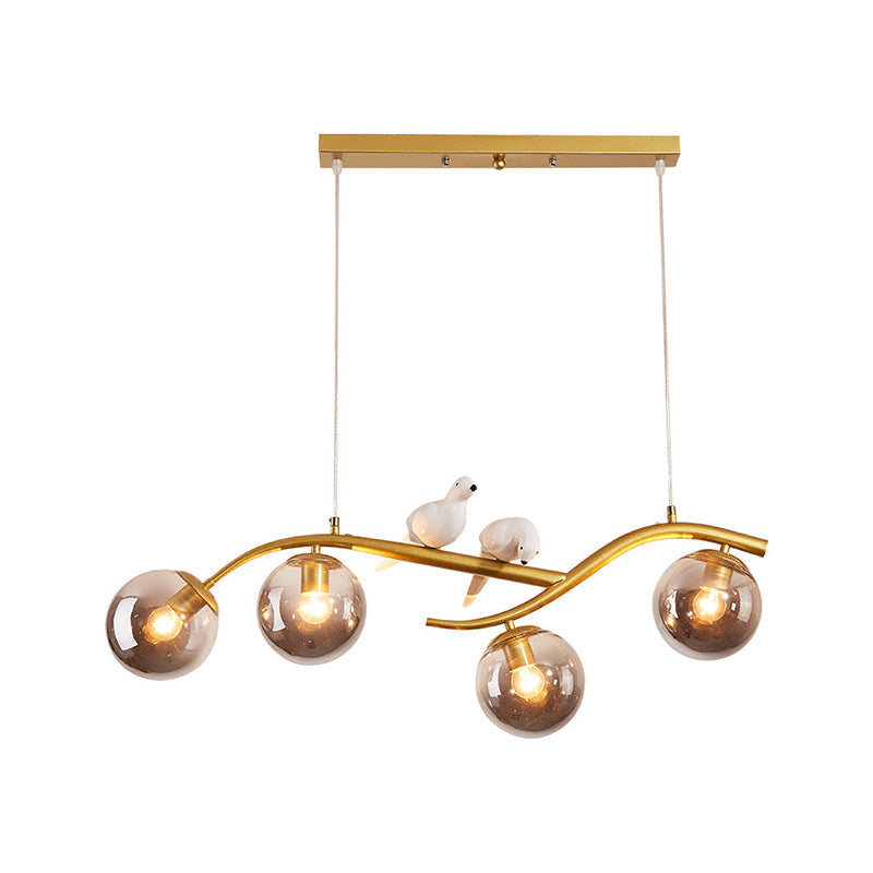 Metal Branch Hanging Lamp Contemporary 4-Light Black/Gold Island Pendant with Bird Deco and Smoke Grey/Cognac Glass Shade Clearhalo 'Ceiling Lights' 'Glass shade' 'Glass' 'Island Lights' Lighting' 1937739