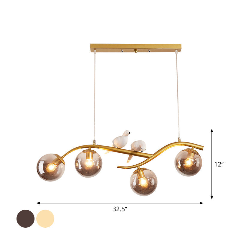 Metal Branch Hanging Lamp Contemporary 4-Light Black/Gold Island Pendant with Bird Deco and Smoke Grey/Cognac Glass Shade Clearhalo 'Ceiling Lights' 'Glass shade' 'Glass' 'Island Lights' Lighting' 1937740