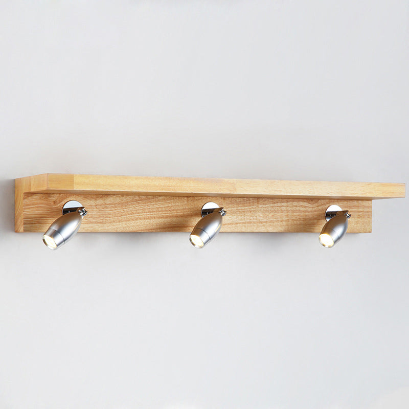 Bullet Shaped Rotating Vanity Light Modern Metal 3 Lights Wood Wall Lighting in Warm/White Light Clearhalo 'Modern wall lights' 'Modern' 'Vanity Lights' 'Wall Lights' Lighting' 1949200