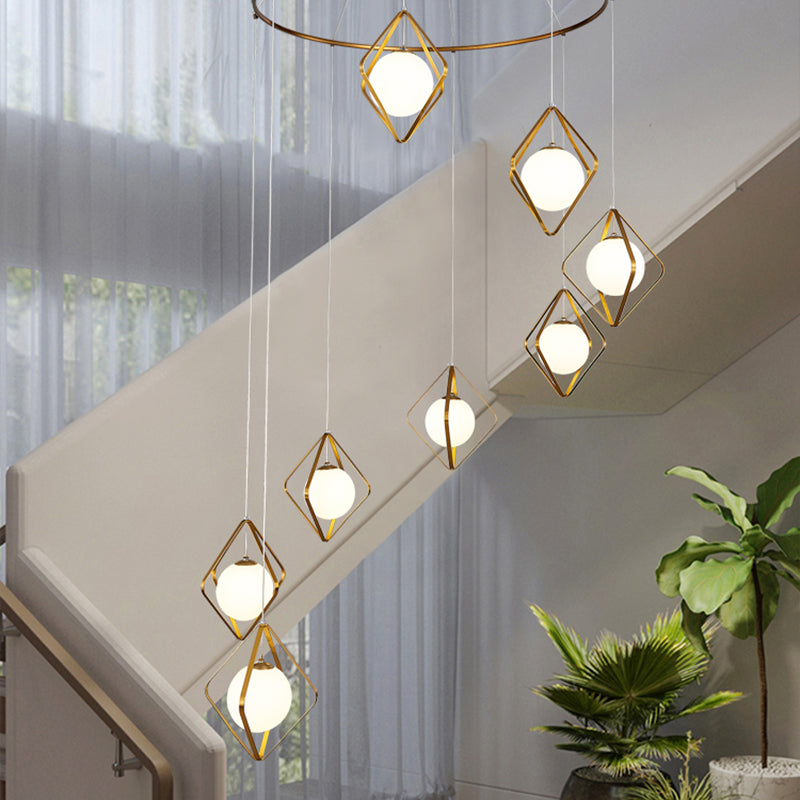 Simple Multi Light Pendant Global Metallic Pendulum Lamp with Opal Glass Shade for Living Room 8 Gold Round Clearhalo 'Ceiling Lights' 'Modern Pendants' 'Modern' 'Pendant Lights' 'Pendants' Lighting' 2025615