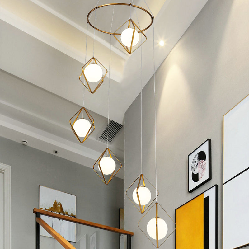 Simple Multi Light Pendant Global Metallic Pendulum Lamp with Opal Glass Shade for Living Room 6 Gold Round Clearhalo 'Ceiling Lights' 'Modern Pendants' 'Modern' 'Pendant Lights' 'Pendants' Lighting' 2025626