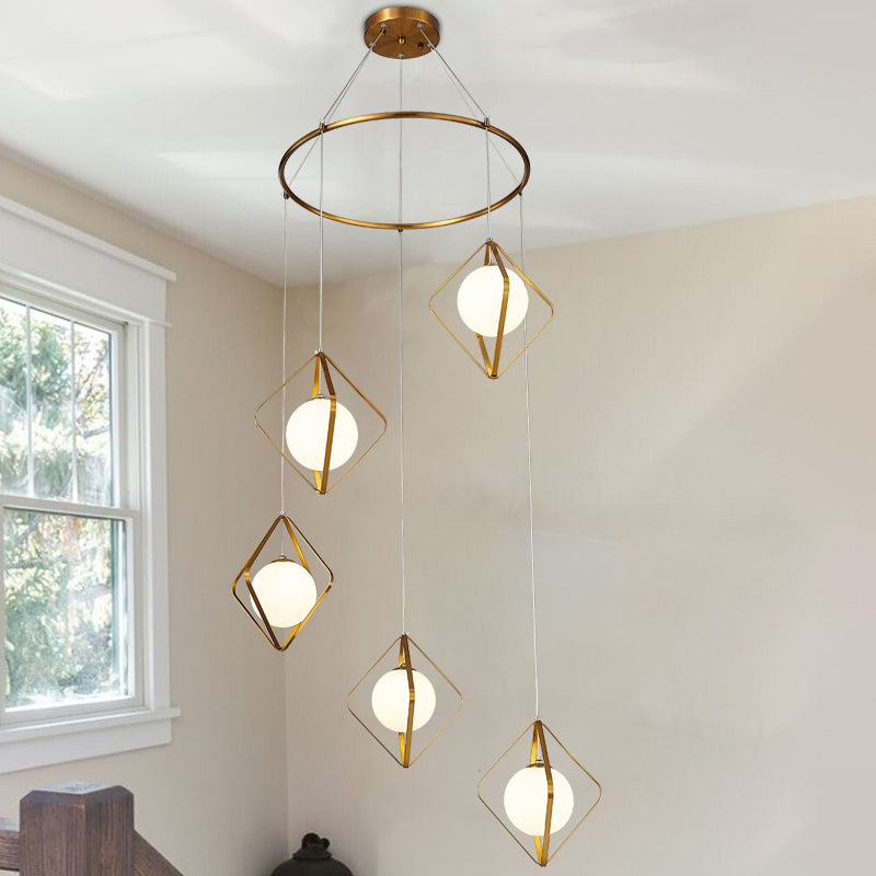 Simple Multi Light Pendant Global Metallic Pendulum Lamp with Opal Glass Shade for Living Room 5 Gold Round Clearhalo 'Ceiling Lights' 'Modern Pendants' 'Modern' 'Pendant Lights' 'Pendants' Lighting' 2025629