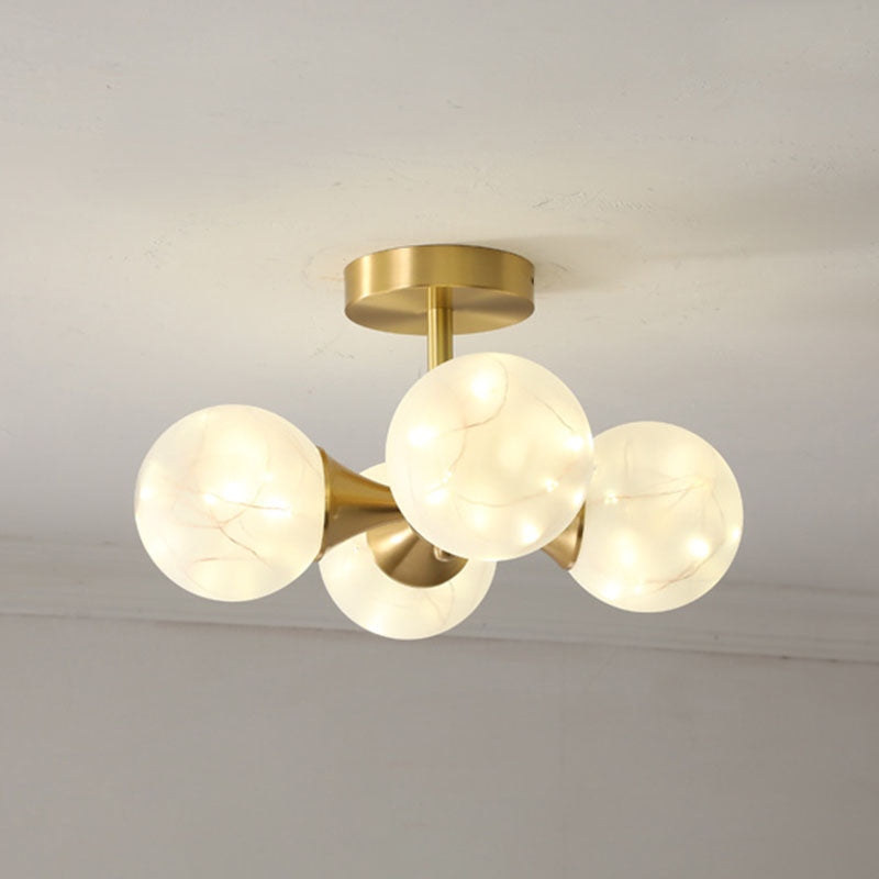 Simple LED Pendant Chandelier Brass Sphere Starry Hanging Lighting with Glass Shade 4 Cream Clearhalo 'Ceiling Lights' 'Chandeliers' 'Modern Chandeliers' 'Modern' Lighting' 2025987