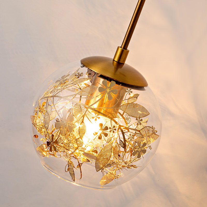Clear Glass Bubble Wall Lamp Contemporary 1-Light Wall Mounted Lamp with Foil Flower Decor Clearhalo 'Cast Iron' 'Glass' 'Industrial' 'Modern wall lights' 'Modern' 'Tiffany' 'Traditional wall lights' 'Wall Lamps & Sconces' 'Wall Lights' Lighting' 2026127