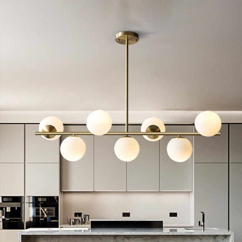 Sphere Island Lighting Contemporary White Glass 7-Light Living Room Pendant Lamp in Brass Clearhalo 'Ceiling Lights' 'Glass shade' 'Glass' 'Island Lights' Lighting' 2039087