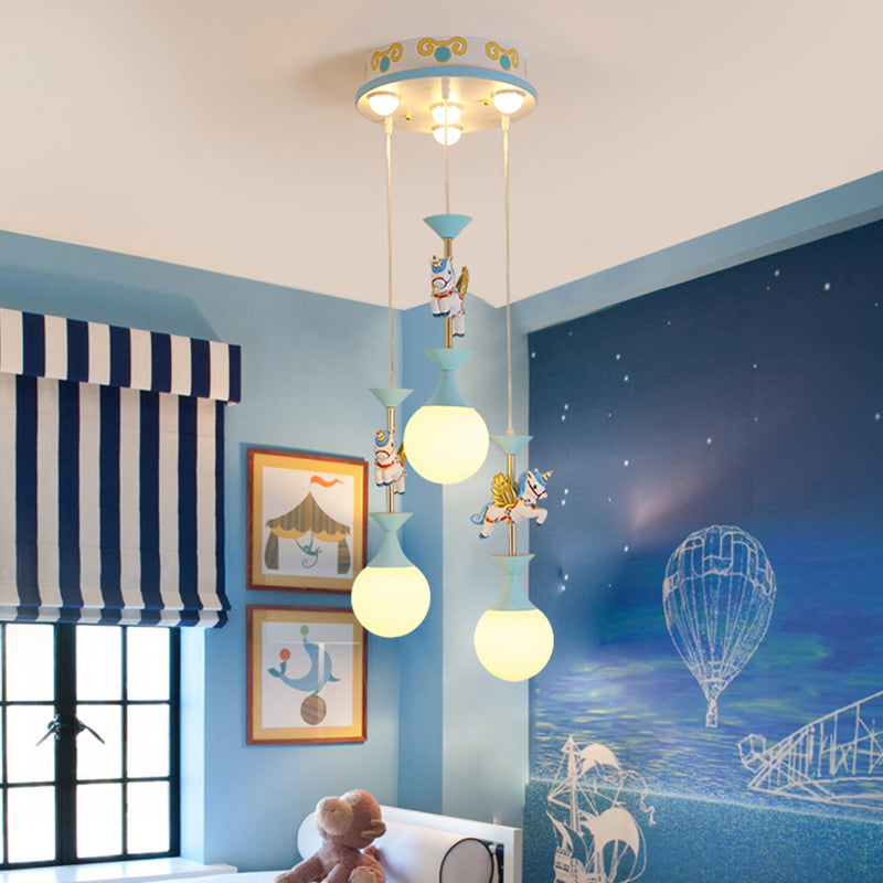 Cartoon Flying Unicorn Multi Light Pendant Resin Kindergarten Hanging Lighting with Sphere Cream Glass Shade Clearhalo 'Ceiling Lights' 'Pendant Lights' 'Pendants' Lighting' 2187791