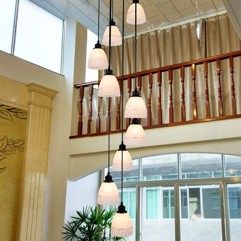 Bell Suspension Light Contemporary White Glass 10 Heads Staircase Multi Light Pendant in Black Clearhalo 'Ceiling Lights' 'Glass shade' 'Glass' 'Modern Pendants' 'Modern' 'Pendant Lights' 'Pendants' Lighting' 2197653