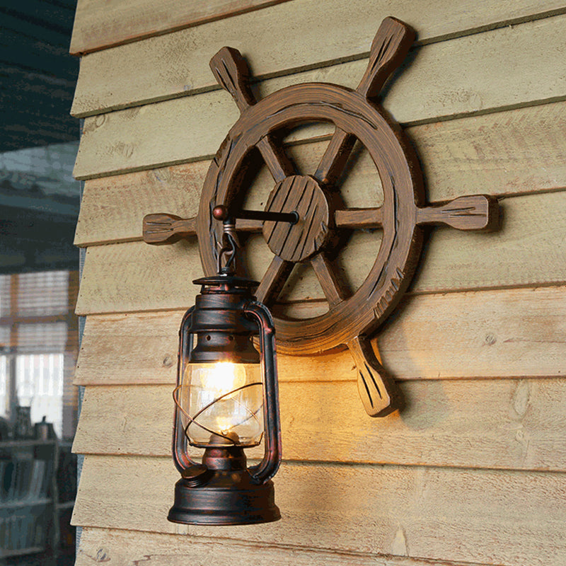Iron Lantern Kerosene Light Industrial Style Single Corridor Wall Lighting Fixture in Bronze Clearhalo 'Art deco wall lights' 'Cast Iron' 'Glass' 'Industrial wall lights' 'Industrial' 'Middle century wall lights' 'Modern' 'Rustic wall lights' 'Tiffany' 'Traditional wall lights' 'Wall Lamps & Sconces' 'Wall Lights' Lighting' 2217263