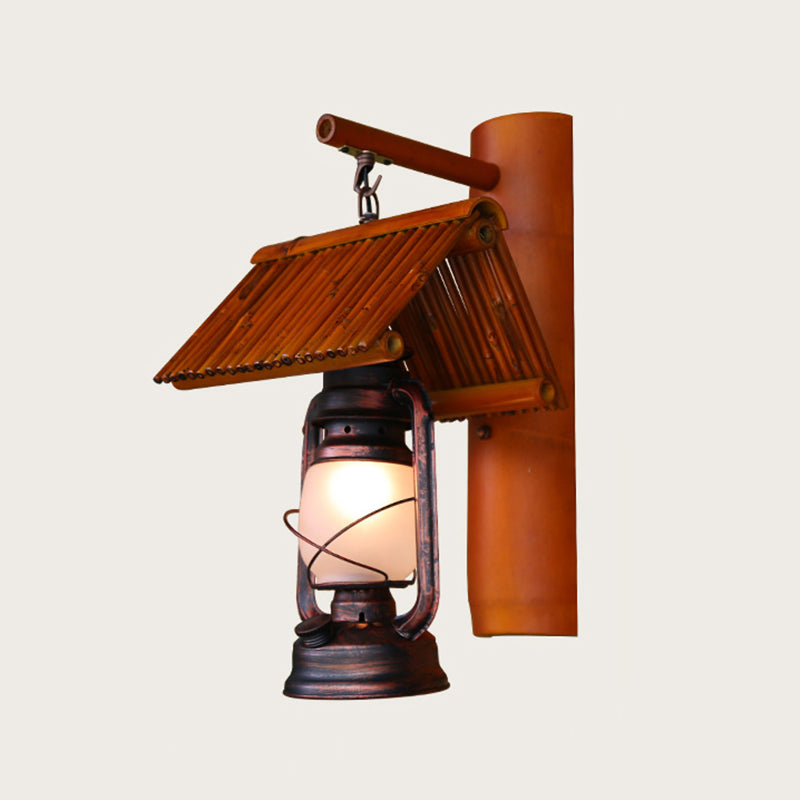 Iron Lantern Kerosene Light Industrial Style Single Corridor Wall Lighting Fixture in Bronze Bronze A Clearhalo 'Art deco wall lights' 'Cast Iron' 'Glass' 'Industrial wall lights' 'Industrial' 'Middle century wall lights' 'Modern' 'Rustic wall lights' 'Tiffany' 'Traditional wall lights' 'Wall Lamps & Sconces' 'Wall Lights' Lighting' 2217264