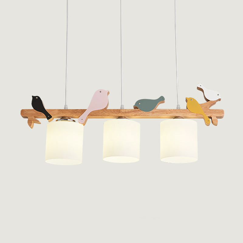 Cylindrical LED Hanging Lamp Simplicity Cream Glass Dining Room Island Chandelier Light with Wooden Bird Clearhalo 'Ceiling Lights' 'Island Lights' Lighting' 2228553
