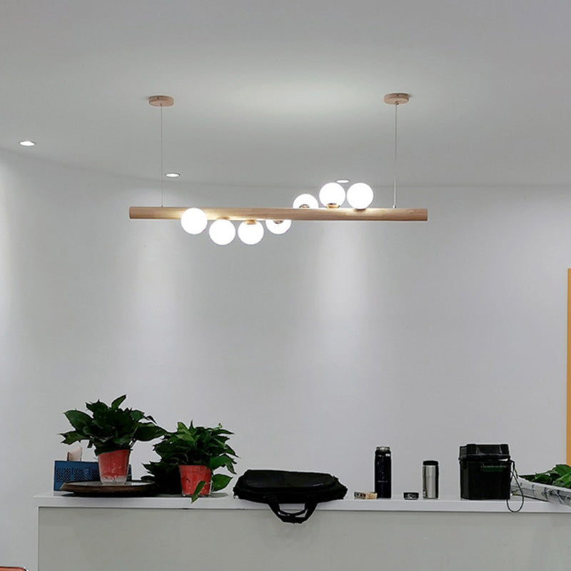 Ball Island Pendant Light Minimalist Cream Glass Restaurant LED Ceiling Light in Wood Clearhalo 'Ceiling Lights' 'Island Lights' Lighting' 2228584