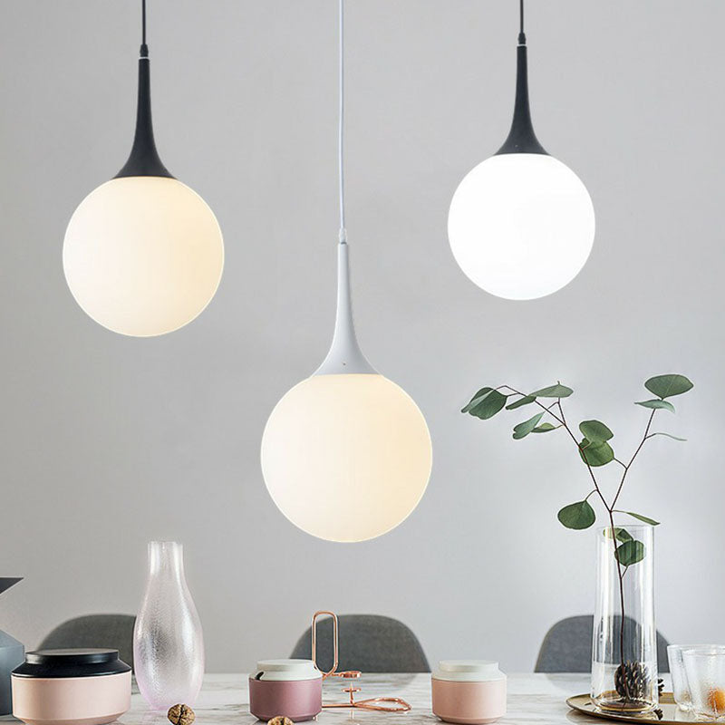 Spherical Cream Glass Suspension Light Minimalist 1-Light Hanging Pendant for Dining Room Clearhalo 'Ceiling Lights' 'Modern Pendants' 'Modern' 'Pendant Lights' 'Pendants' Lighting' 2254813