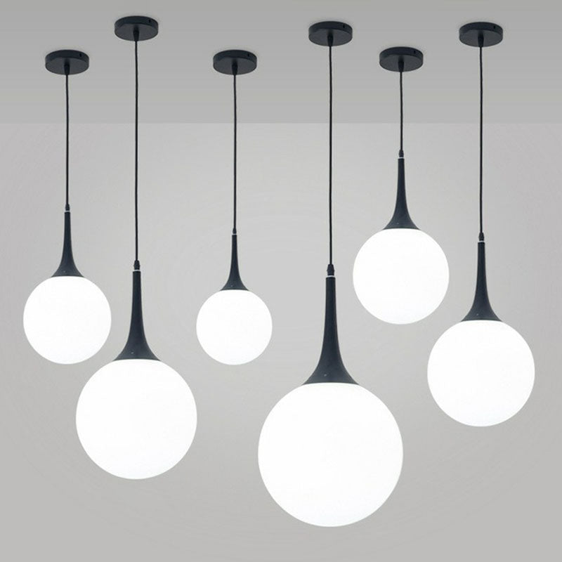 Spherical Cream Glass Suspension Light Minimalist 1-Light Hanging Pendant for Dining Room Clearhalo 'Ceiling Lights' 'Modern Pendants' 'Modern' 'Pendant Lights' 'Pendants' Lighting' 2254815