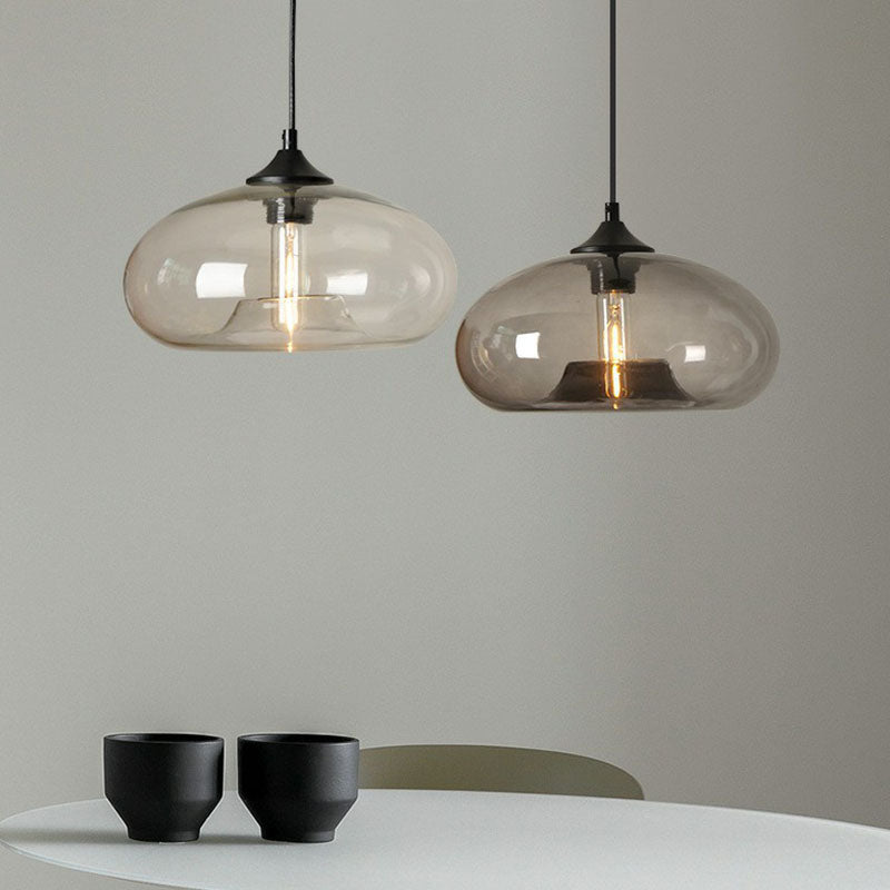 Modern Ellipse Suspension Lamp Glass 1 Head Dining Table Pendant Light Fixture in Black Clearhalo 'Ceiling Lights' 'Modern Pendants' 'Modern' 'Pendant Lights' 'Pendants' Lighting' 2254997