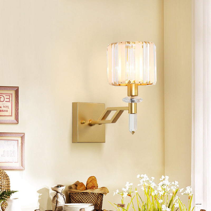 Cylindrical Clear Crystal Wall Light Modernist Style 1 Light Black/Gold Finish Wall Sconce Fixture with Curved Arm Gold Clearhalo 'Cast Iron' 'Glass' 'Industrial' 'Modern wall lights' 'Modern' 'Tiffany' 'Traditional wall lights' 'Wall Lamps & Sconces' 'Wall Lights' Lighting' 225756